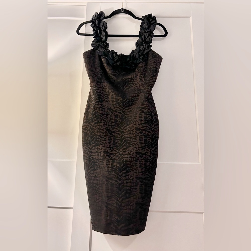 Maggy London Cocktail Dress knee length size 4 fits like a 2. Black and brown.